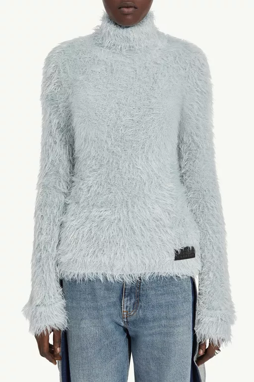 Jersey de cuello alto de pelo sint&eacute;tico - Punto