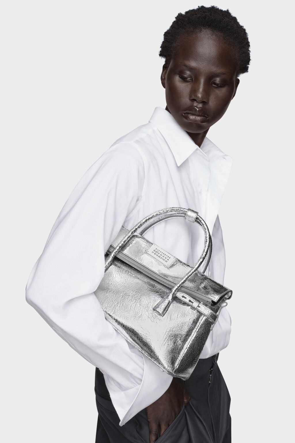 Dua Lipa’s Latest Fit Just Broke the Internet: Graphic Tee + Leather Skirt Combo