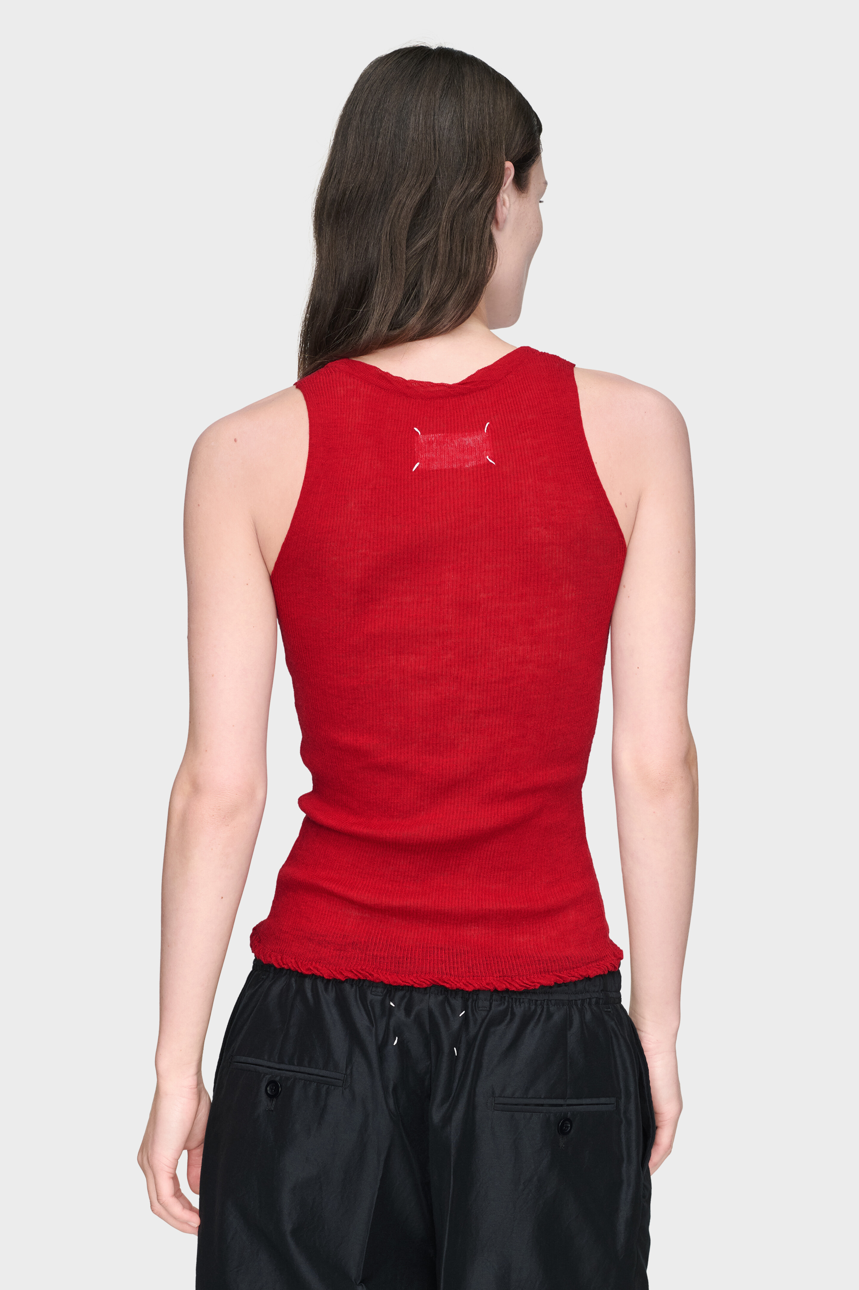 TWIST FINISHING KNIT TOP