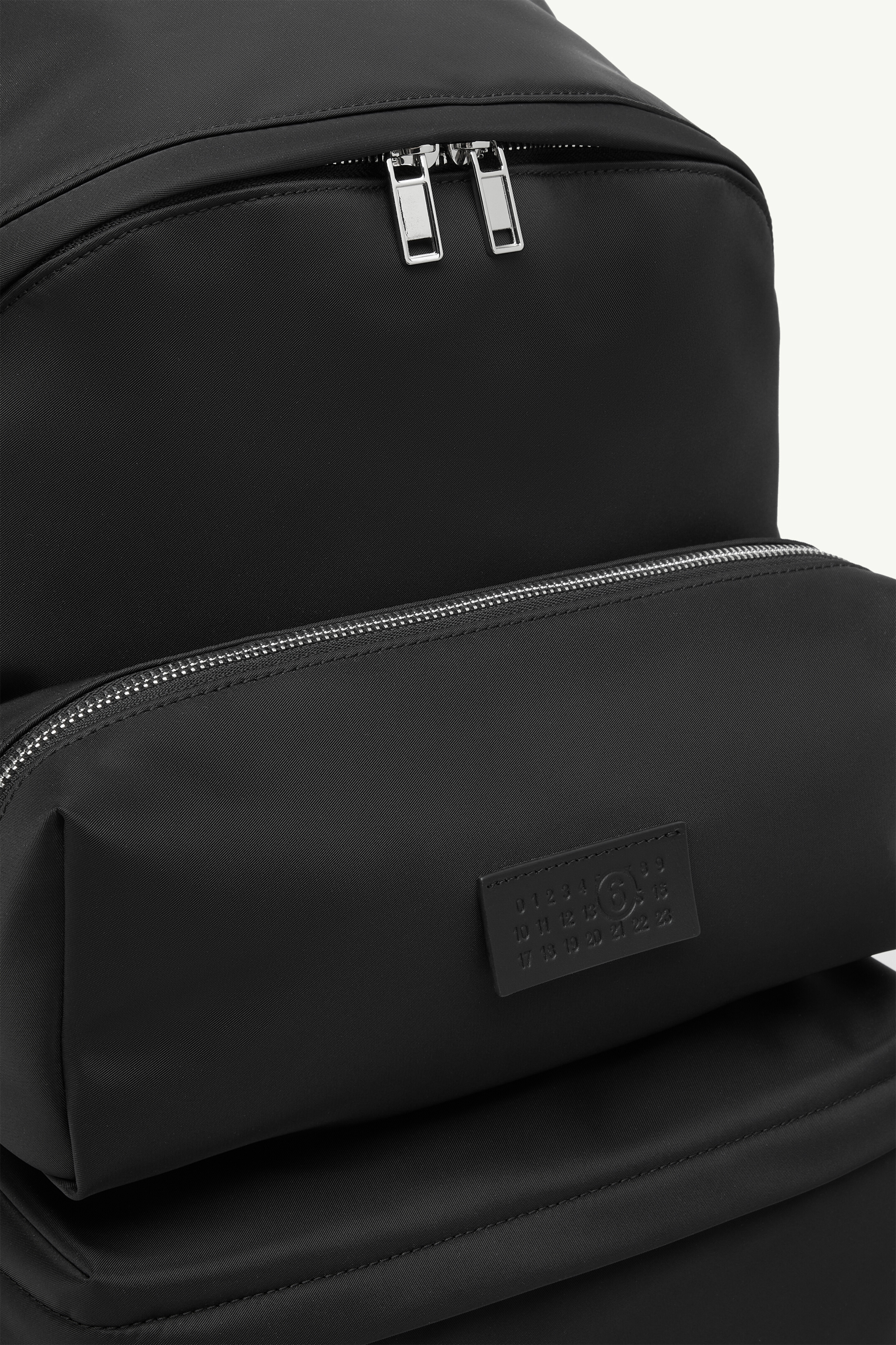 THREE POCKET BACKPACK
