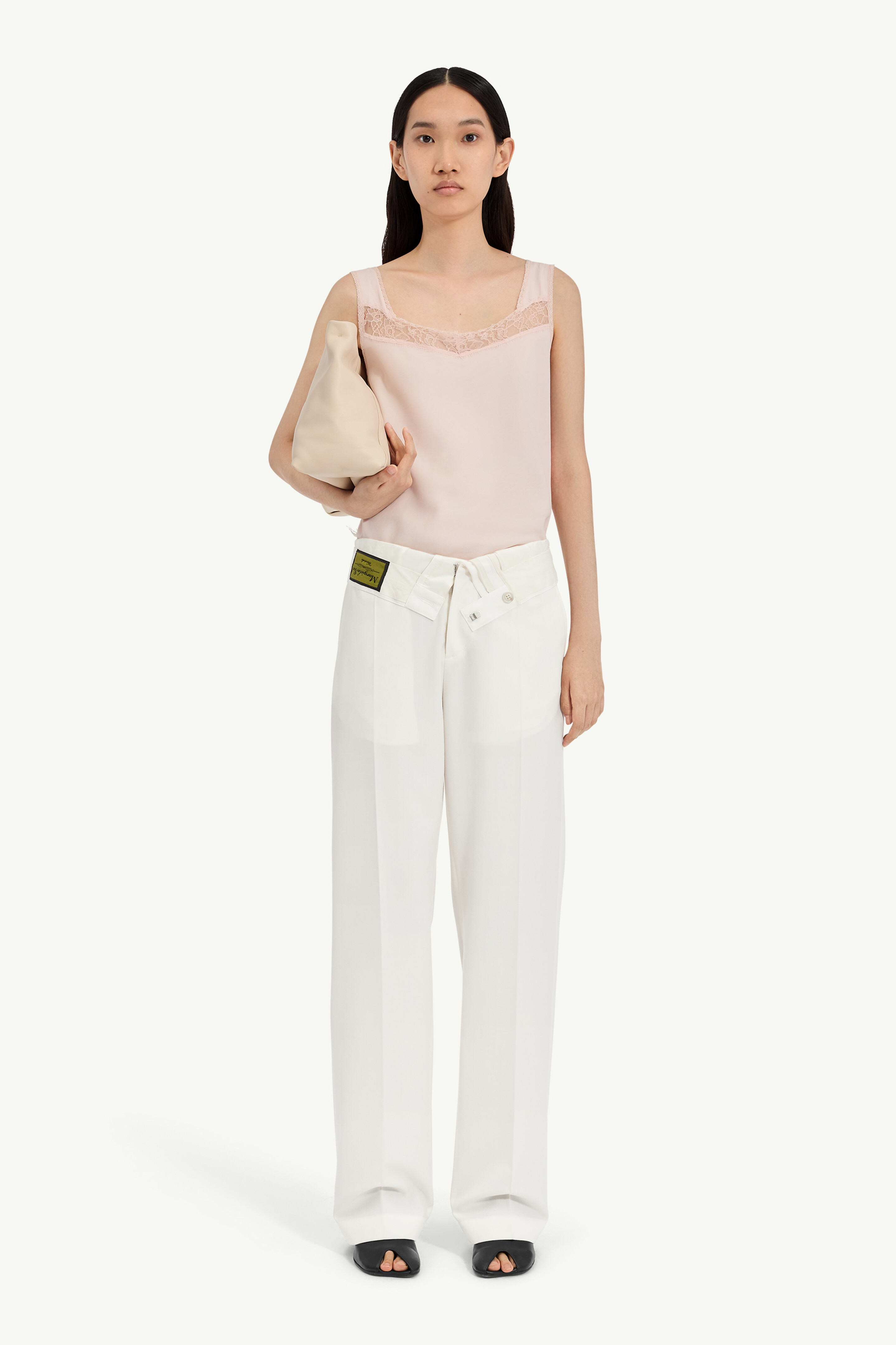 Reverse waistband trousers