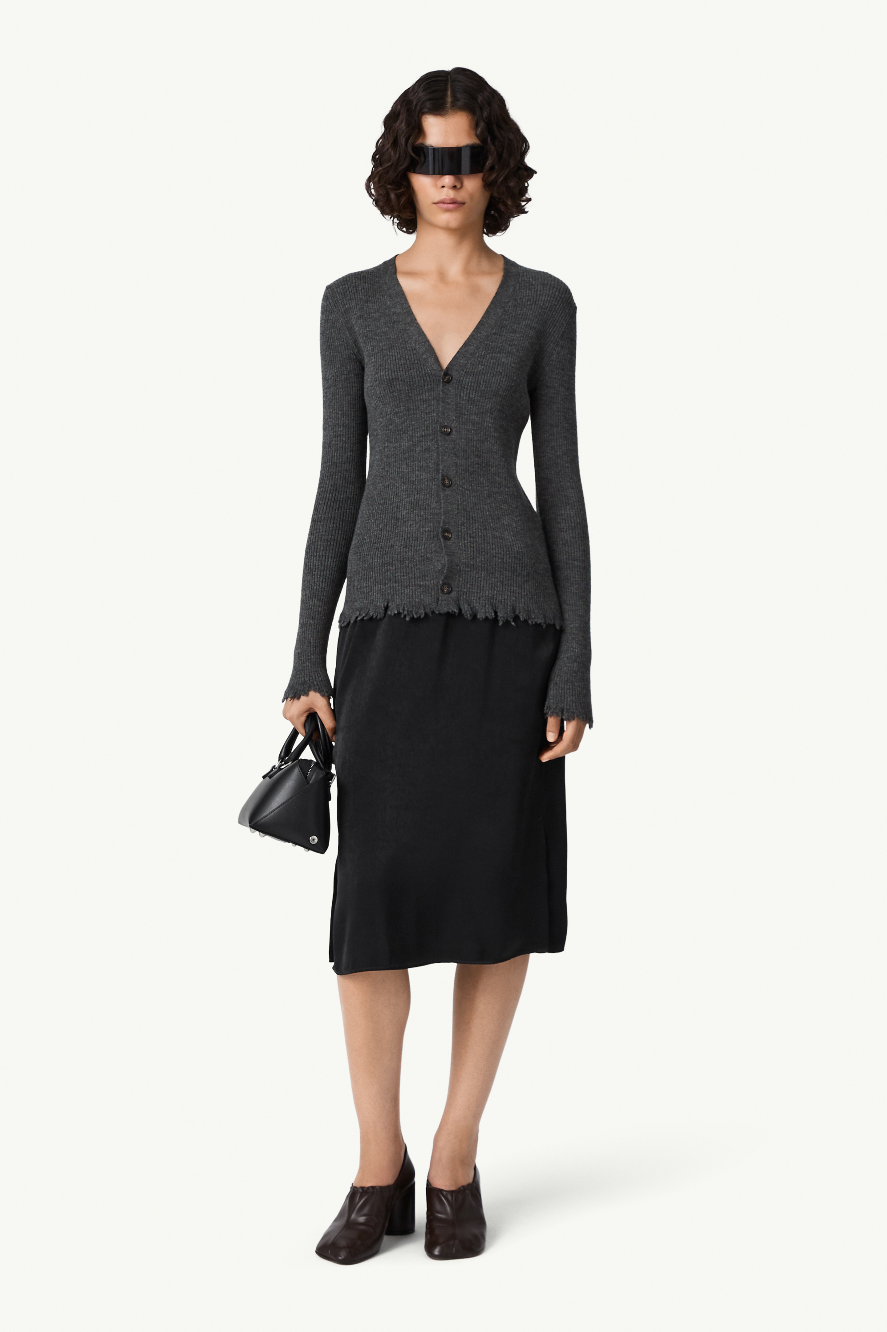 Cardigan in maglia con orlo distressed